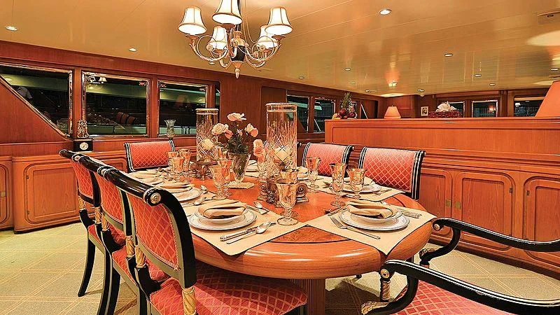 a dining room with a table set for a dinner aboard NORDIC STAR Yacht for Sale