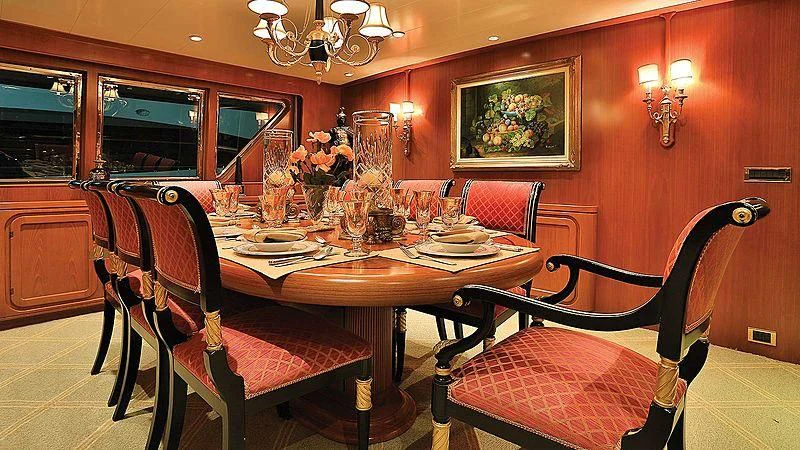 a dining room with a table and chairs aboard NORDIC STAR Yacht for Sale