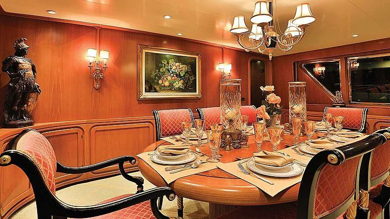 a dining room with a table set aboard NORDIC STAR Yacht for Sale