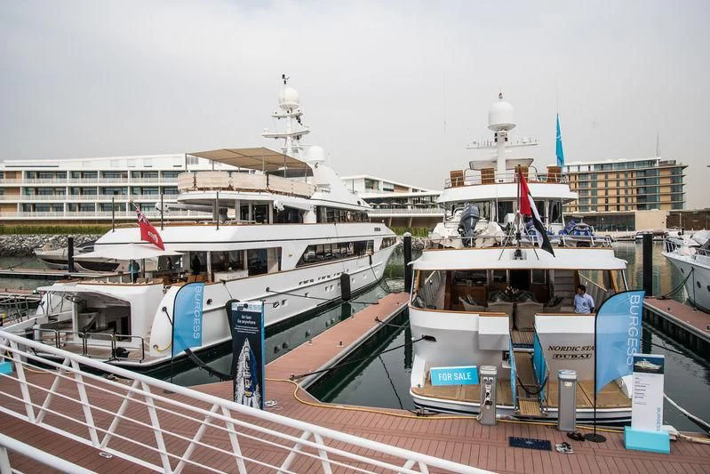 boats docked at a pier aboard NORDIC STAR Yacht for Sale