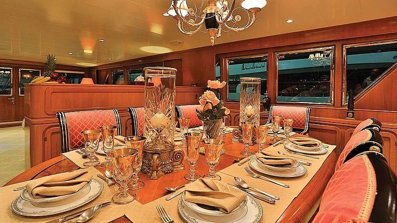 a table with plates and glasses aboard NORDIC STAR Yacht for Sale