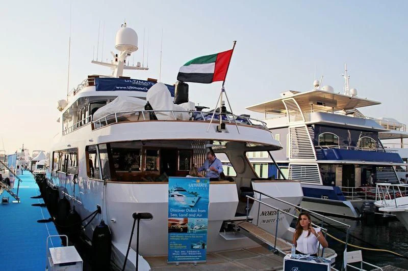 a boat with a flag on the front aboard NORDIC STAR Yacht for Sale