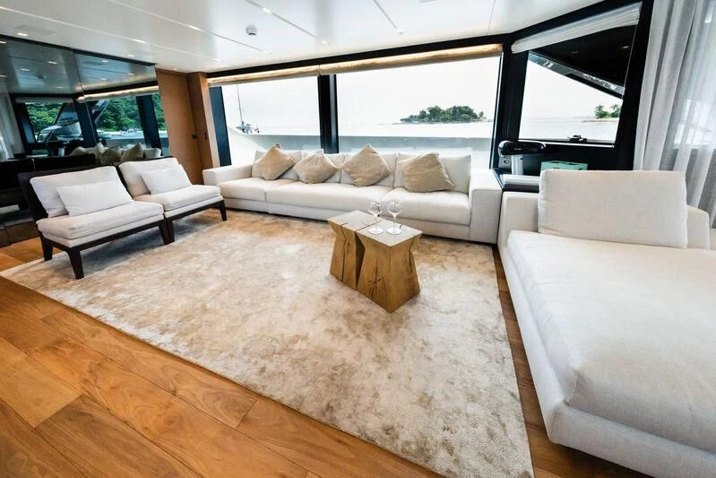 a living room with a large window aboard DA MOON Yacht for Sale