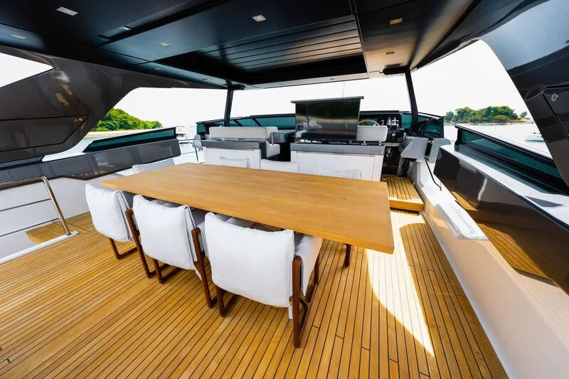 a large room with tables and chairs aboard DA MOON Yacht for Sale