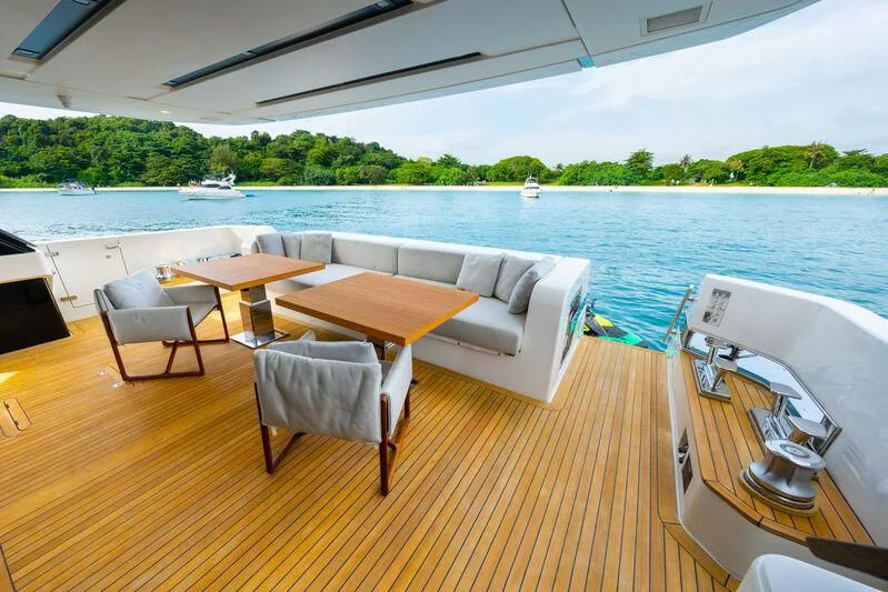 a room with a table and chairs aboard DA MOON Yacht for Sale