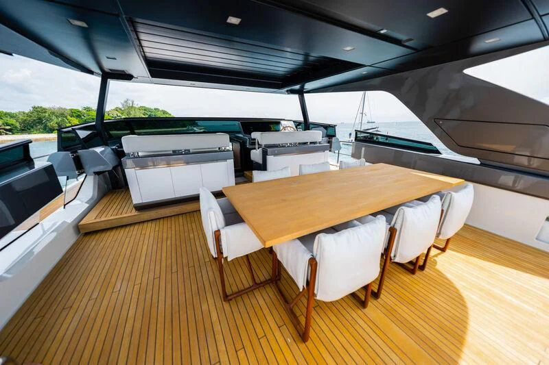 a large room with tables and chairs aboard DA MOON Yacht for Sale