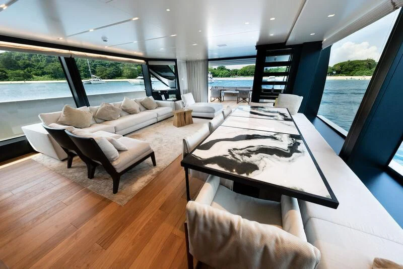 a living room with a large window aboard DA MOON Yacht for Sale