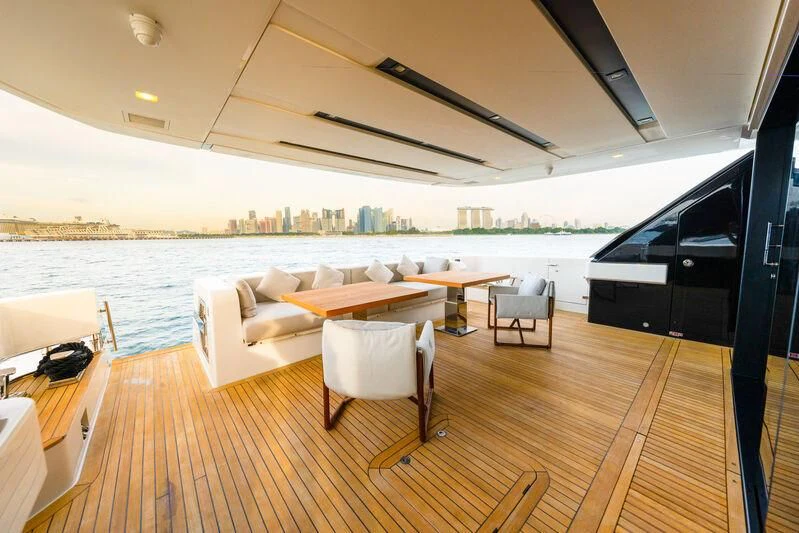 a living room with a large patio aboard DA MOON Yacht for Sale