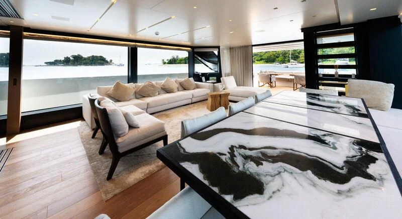 a living room with a large window aboard DA MOON Yacht for Sale