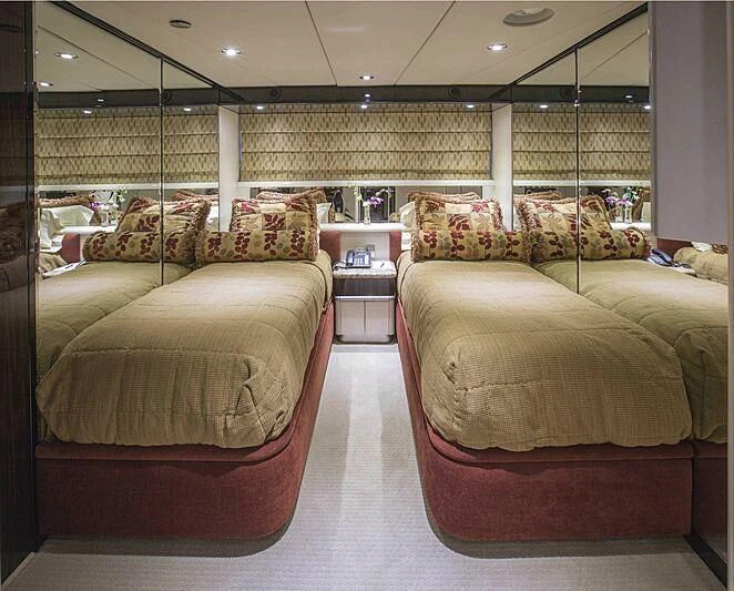 a couple of beds in a room aboard GRADE I Yacht for Charter