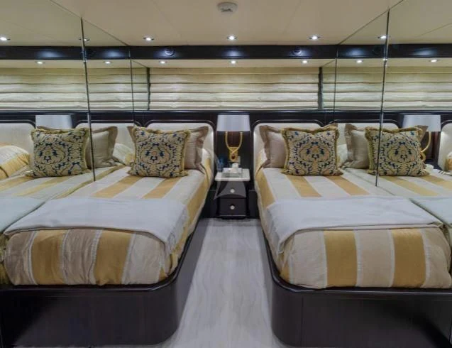 a couple of beds in a room aboard GRADE I Yacht for Charter