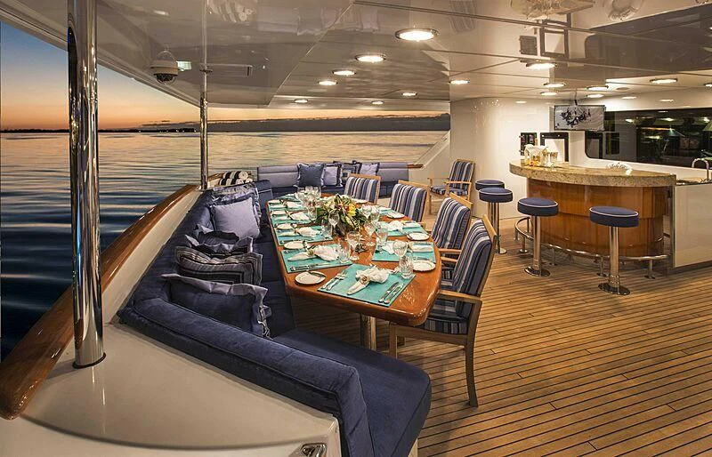 a room with a couch and a table aboard GRADE I Yacht for Charter