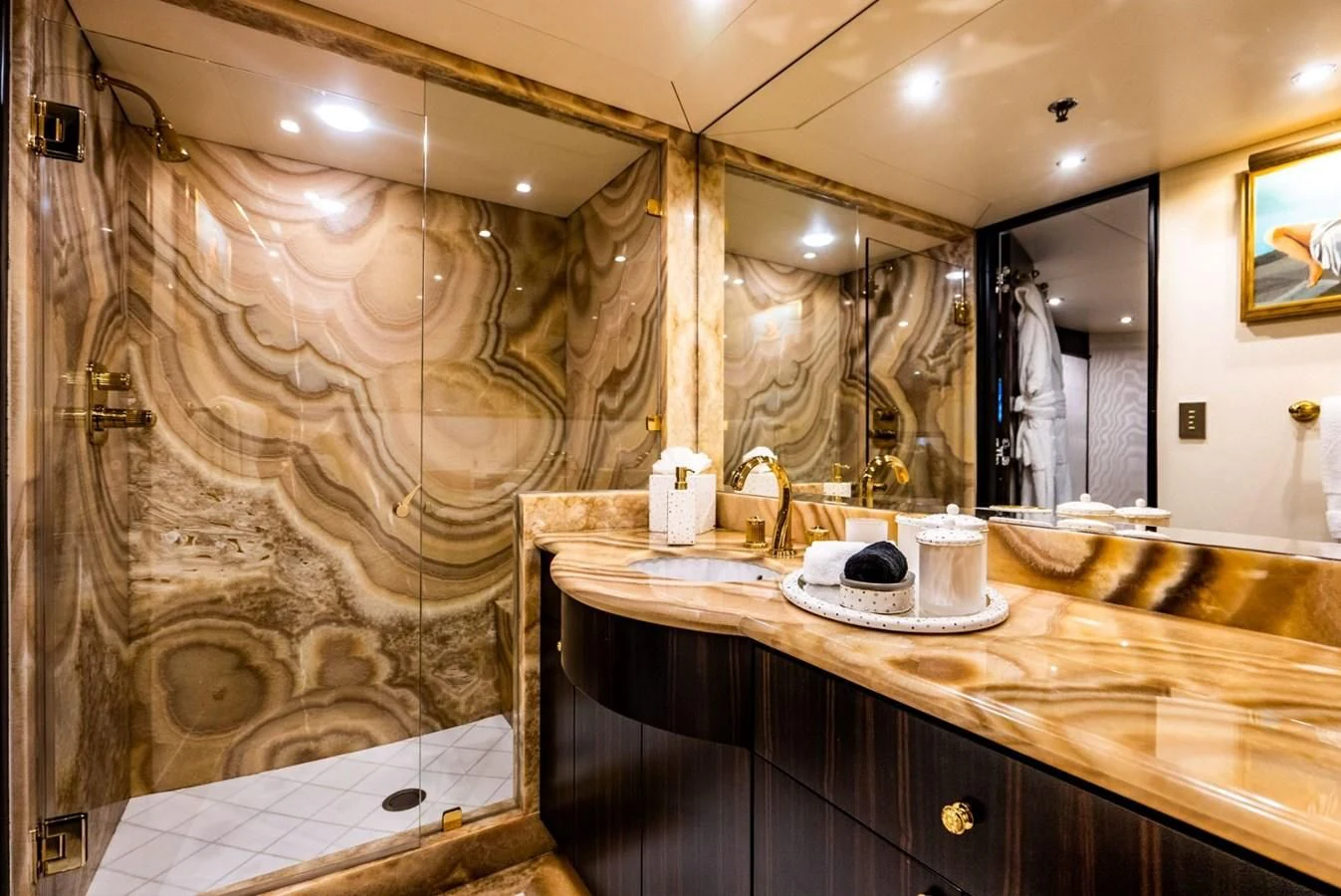 a bathroom with a large marble countertop aboard GRADE I Yacht for Charter