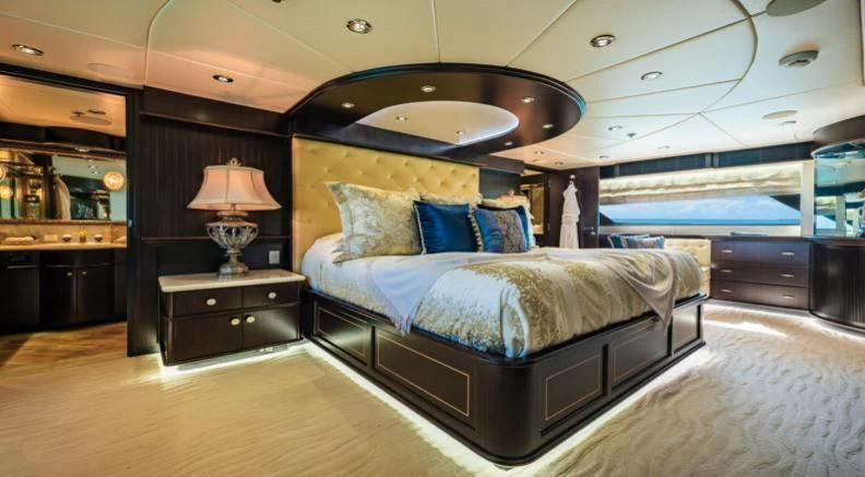 a large bed in a room aboard GRADE I Yacht for Charter