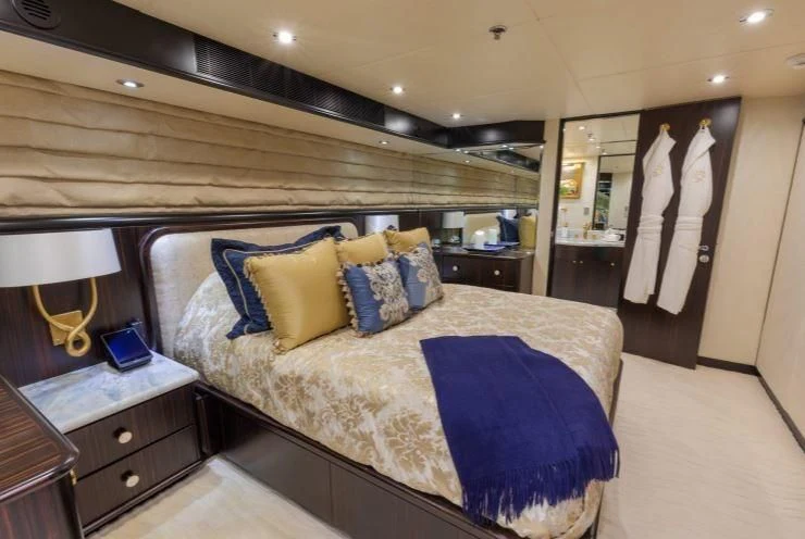 a bed in a room aboard GRADE I Yacht for Charter