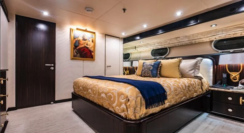 a bed in a room aboard GRADE I Yacht for Charter