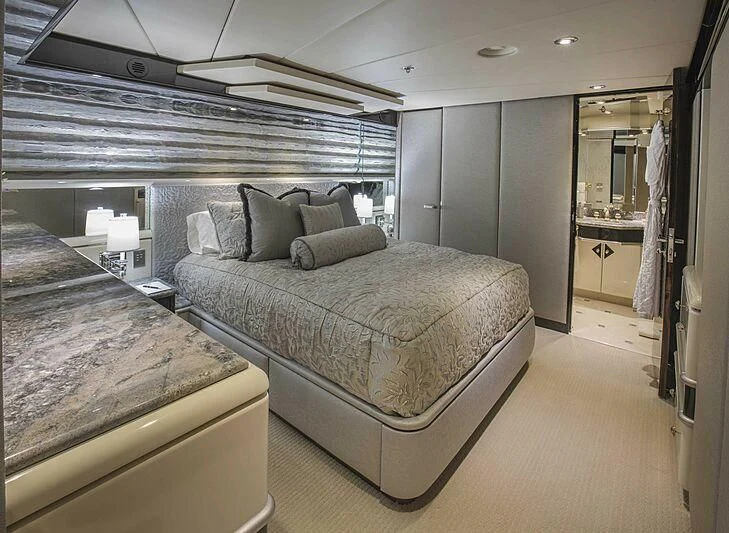 a room with two beds aboard GRADE I Yacht for Charter
