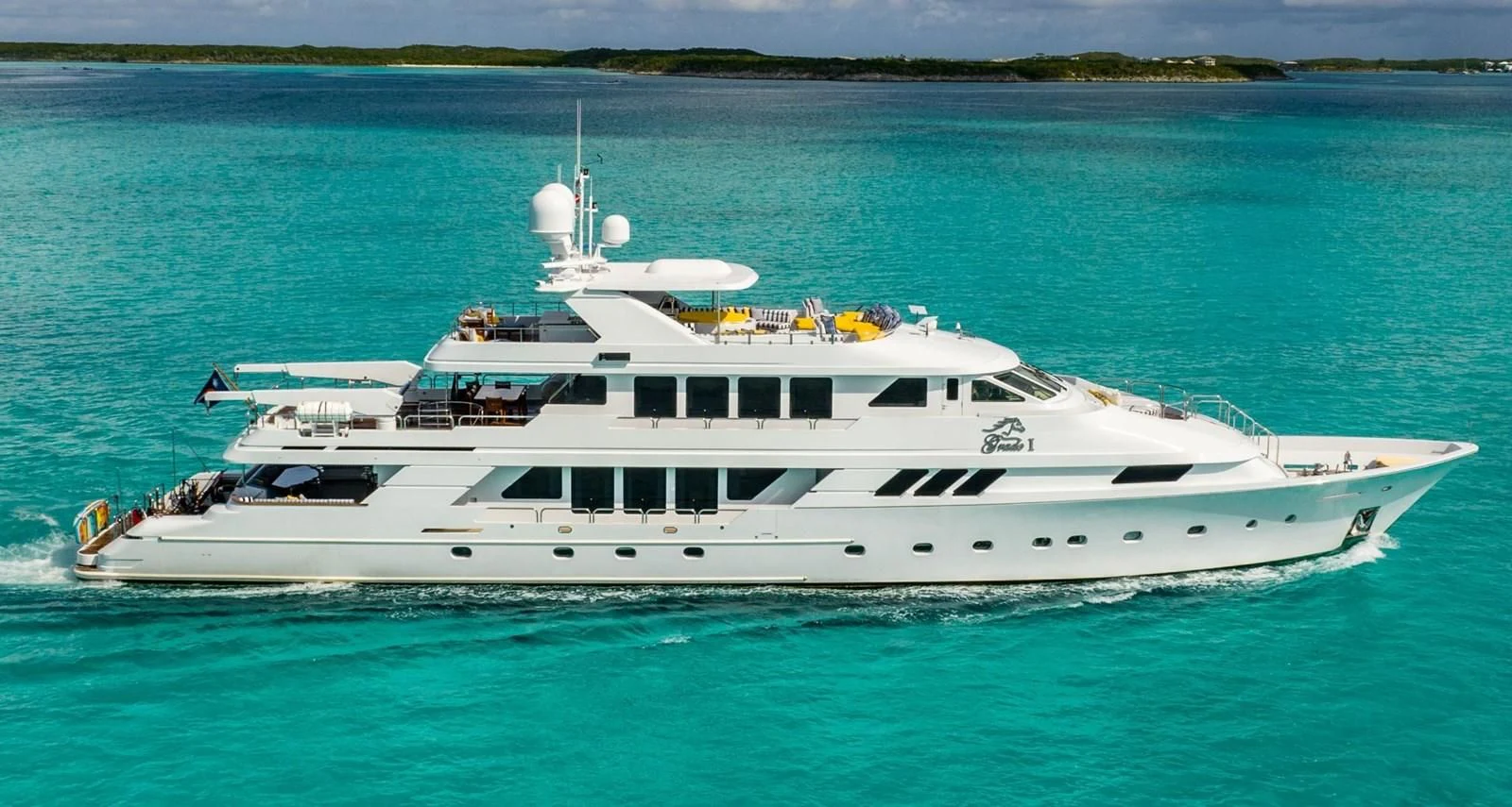 a white yacht in the water aboard GRADE I Yacht for Charter