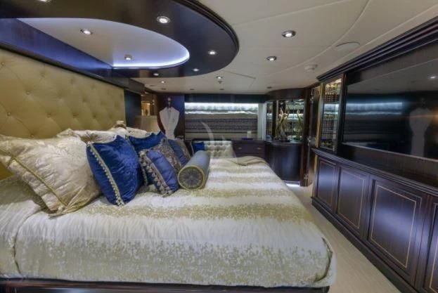a bed in a room aboard GRADE I Yacht for Charter