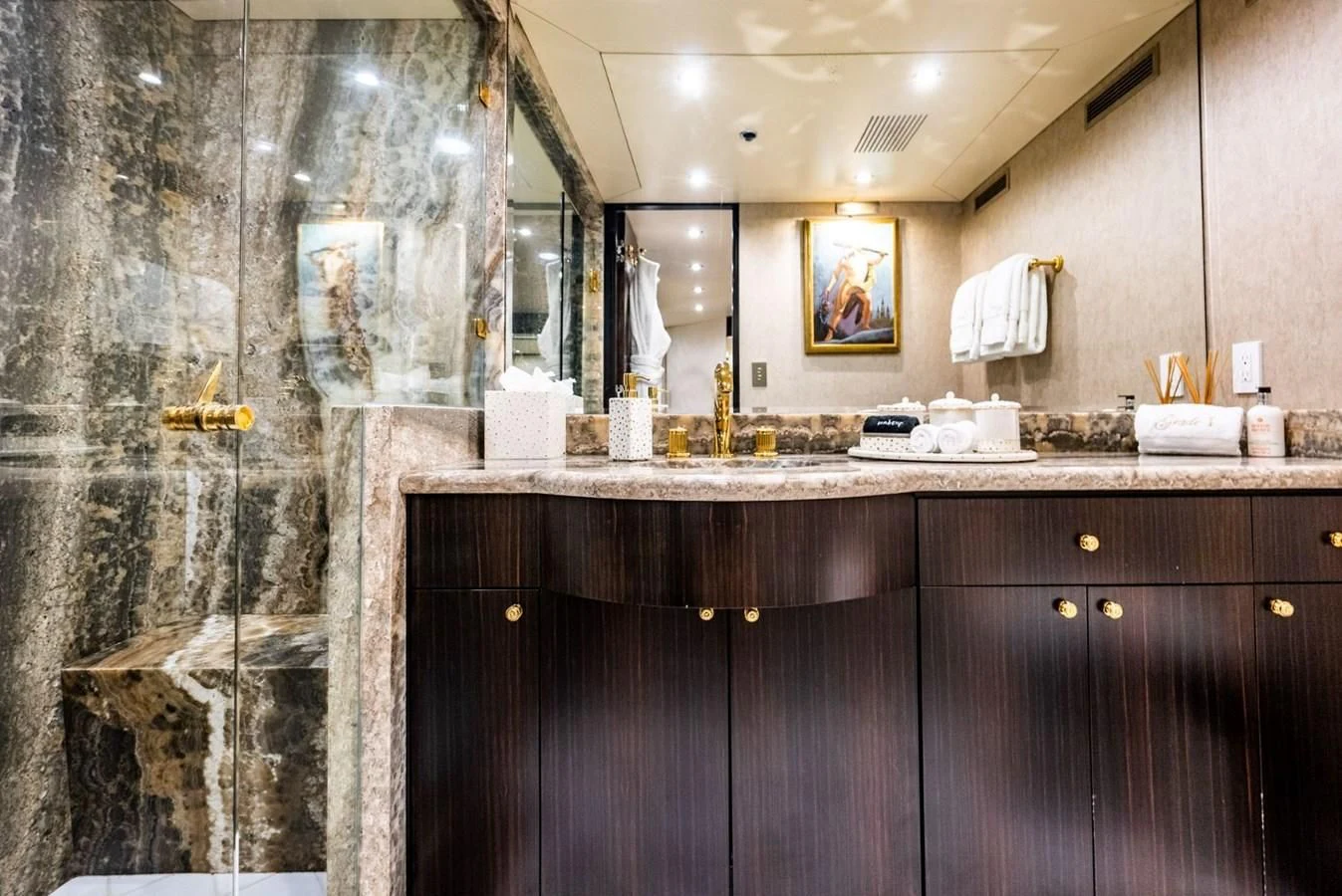 a bathroom with a marble counter top aboard GRADE I Yacht for Charter