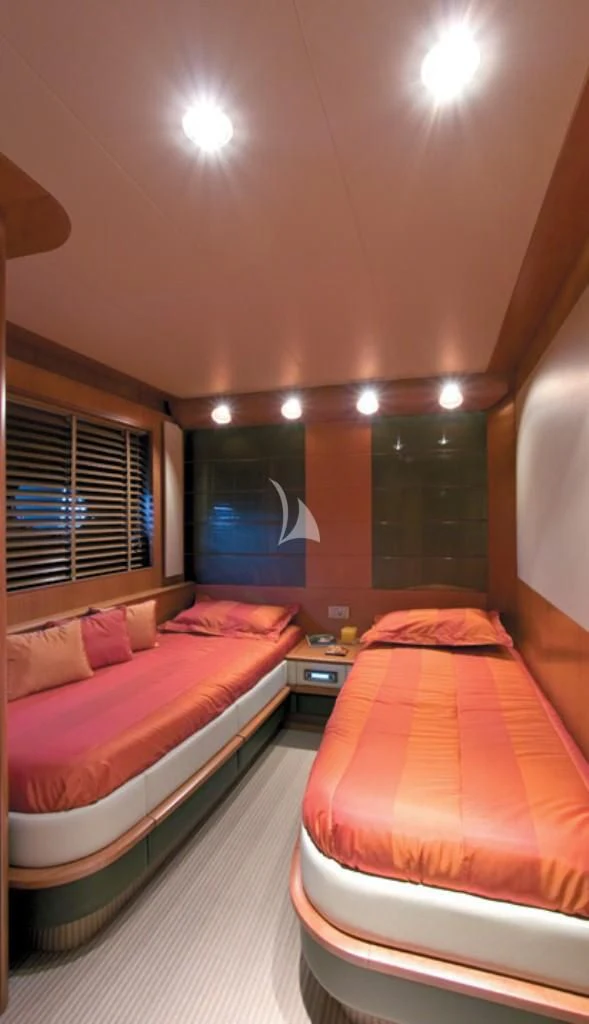 a room with two beds aboard SUR L'ONDE 2 Yacht for Sale