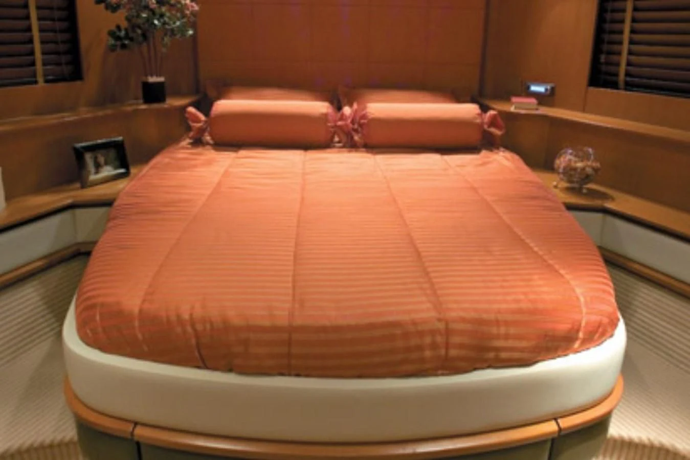 a bed with a pillow aboard SUR L'ONDE 2 Yacht for Sale