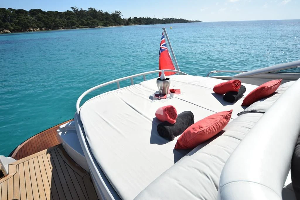 a person lying on a boat aboard SUR L'ONDE 2 Yacht for Sale