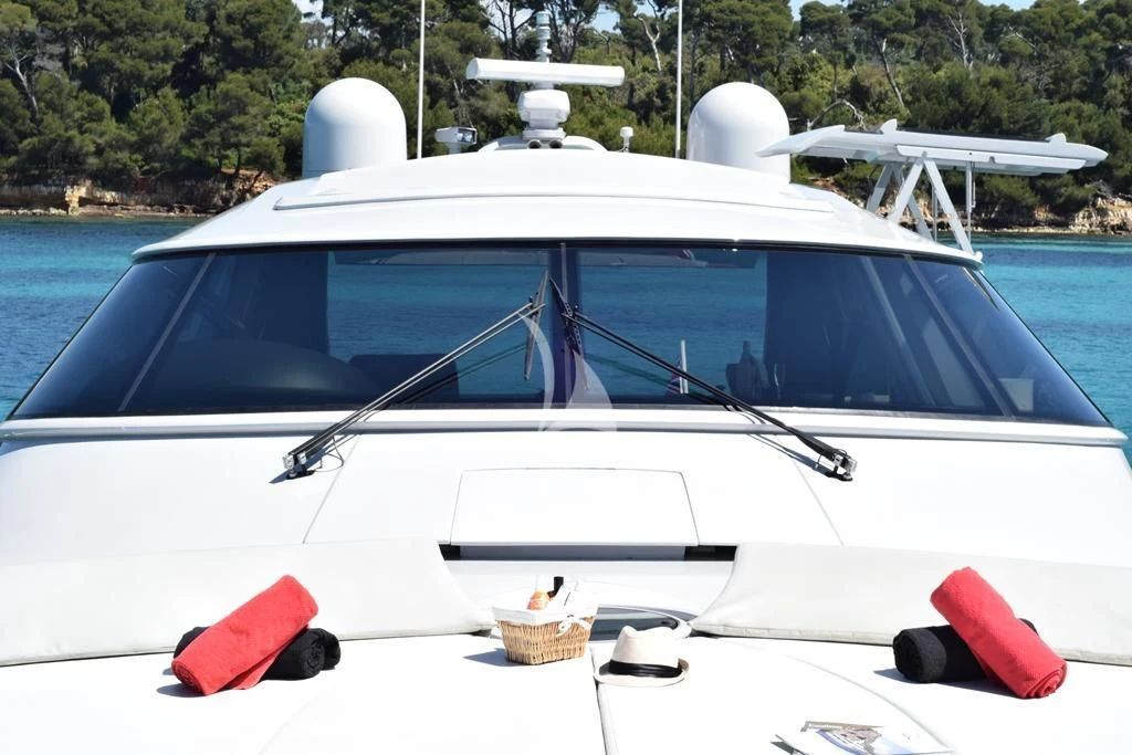 a white car with a basket on the front aboard SUR L'ONDE 2 Yacht for Sale