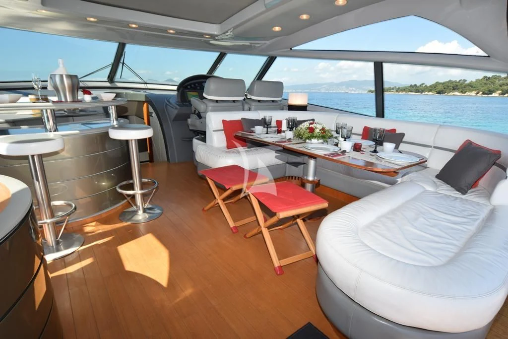a boat with tables and chairs aboard SUR L'ONDE 2 Yacht for Sale