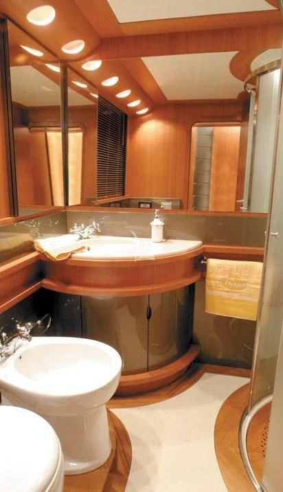 a bathroom with a sink and a mirror aboard SUR L'ONDE 2 Yacht for Sale