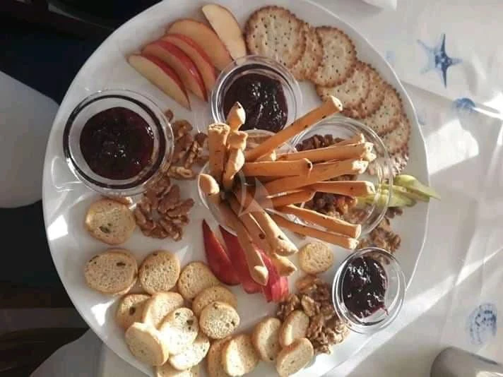 a tray of food aboard LIANA H Yacht for Charter