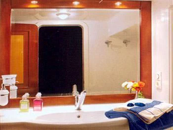 a bathroom with a large mirror aboard LIANA H Yacht for Charter