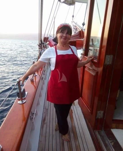 a person on a boat aboard LIANA H Yacht for Charter