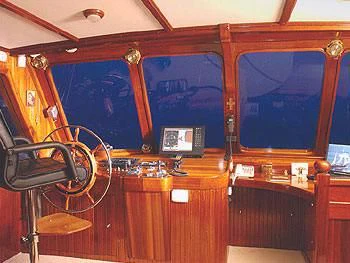 a train with a large mirror aboard LIANA H Yacht for Charter