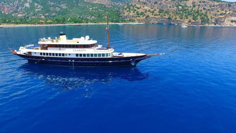 a boat on the water aboard OMNIA 1 Yacht for Sale