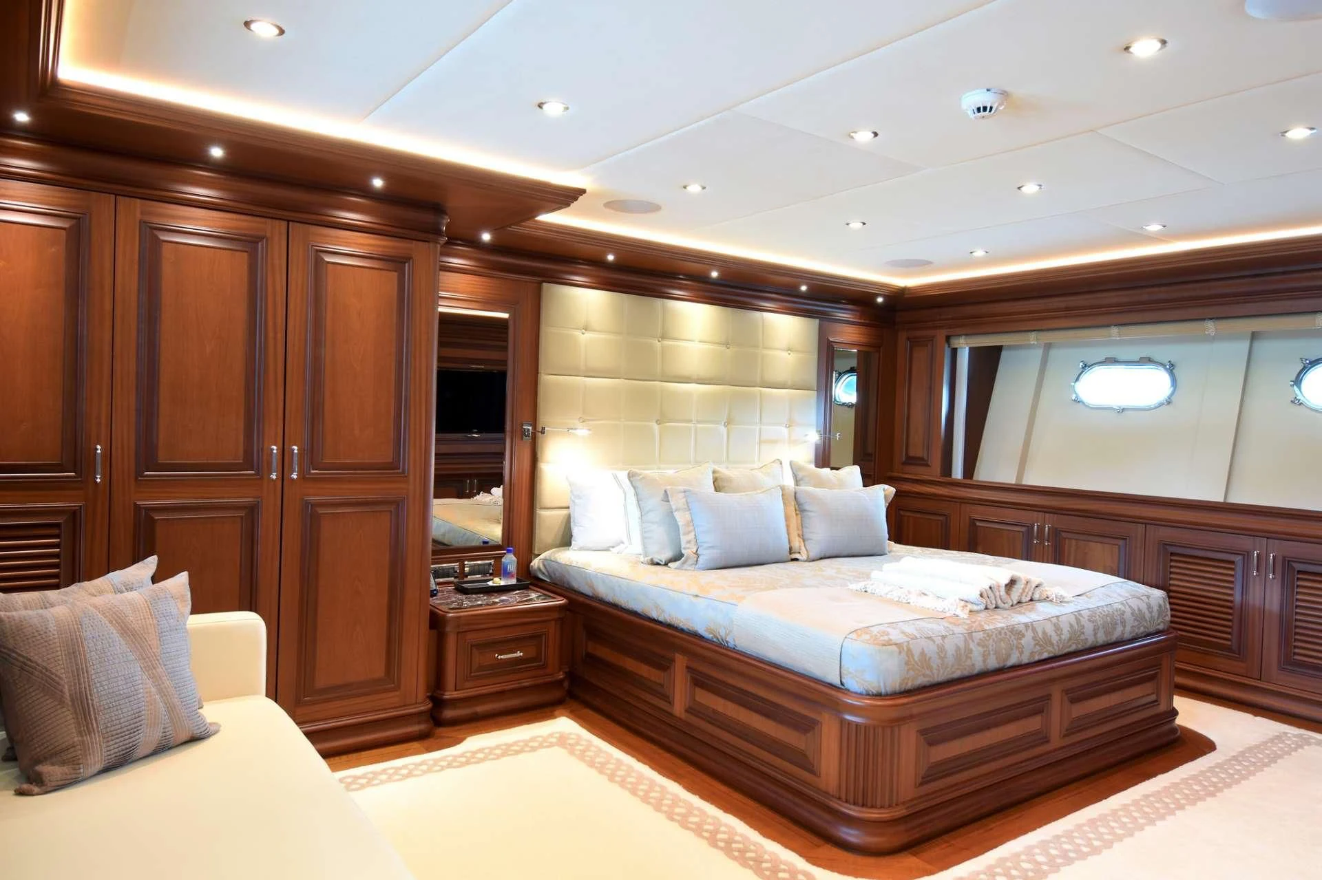a large hotel room with a large bed aboard OMNIA 1 Yacht for Sale