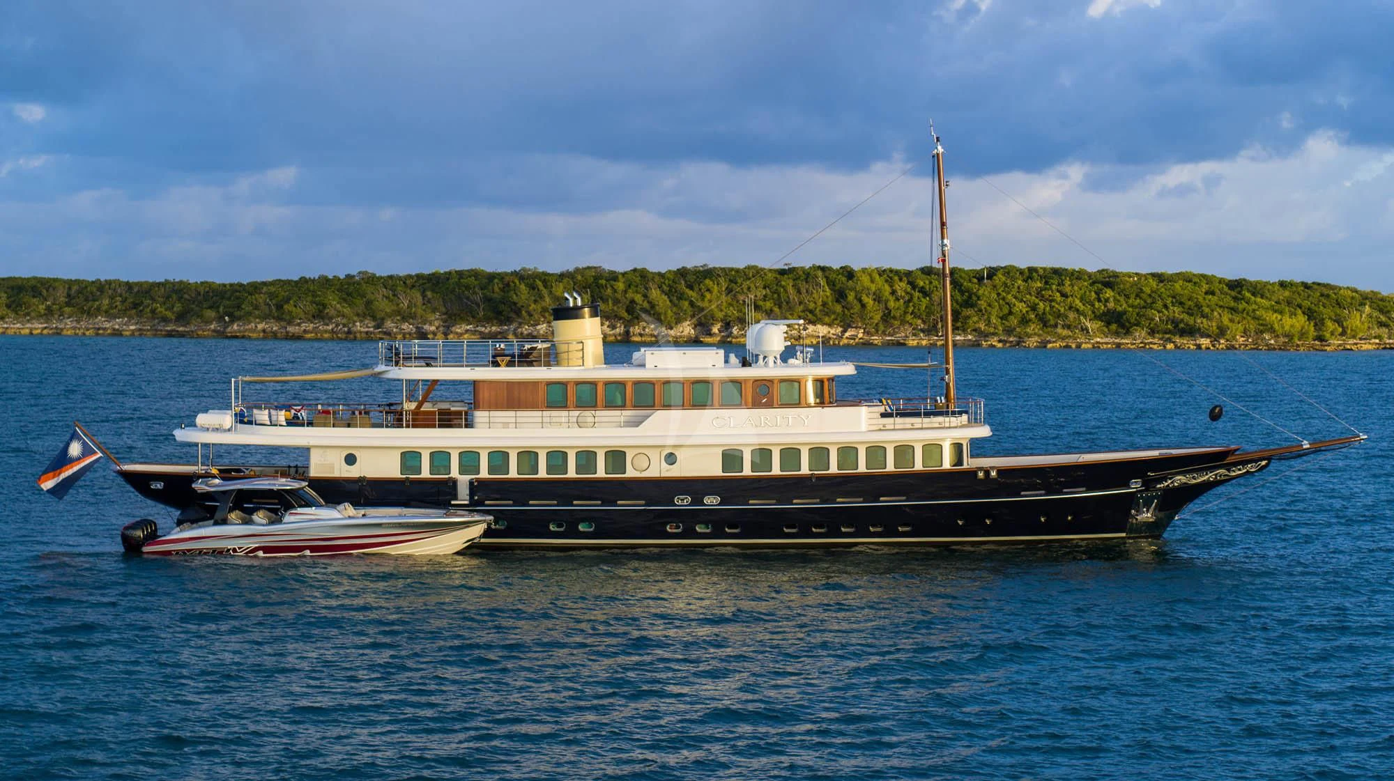 a large boat in the water aboard OMNIA 1 Yacht for Sale
