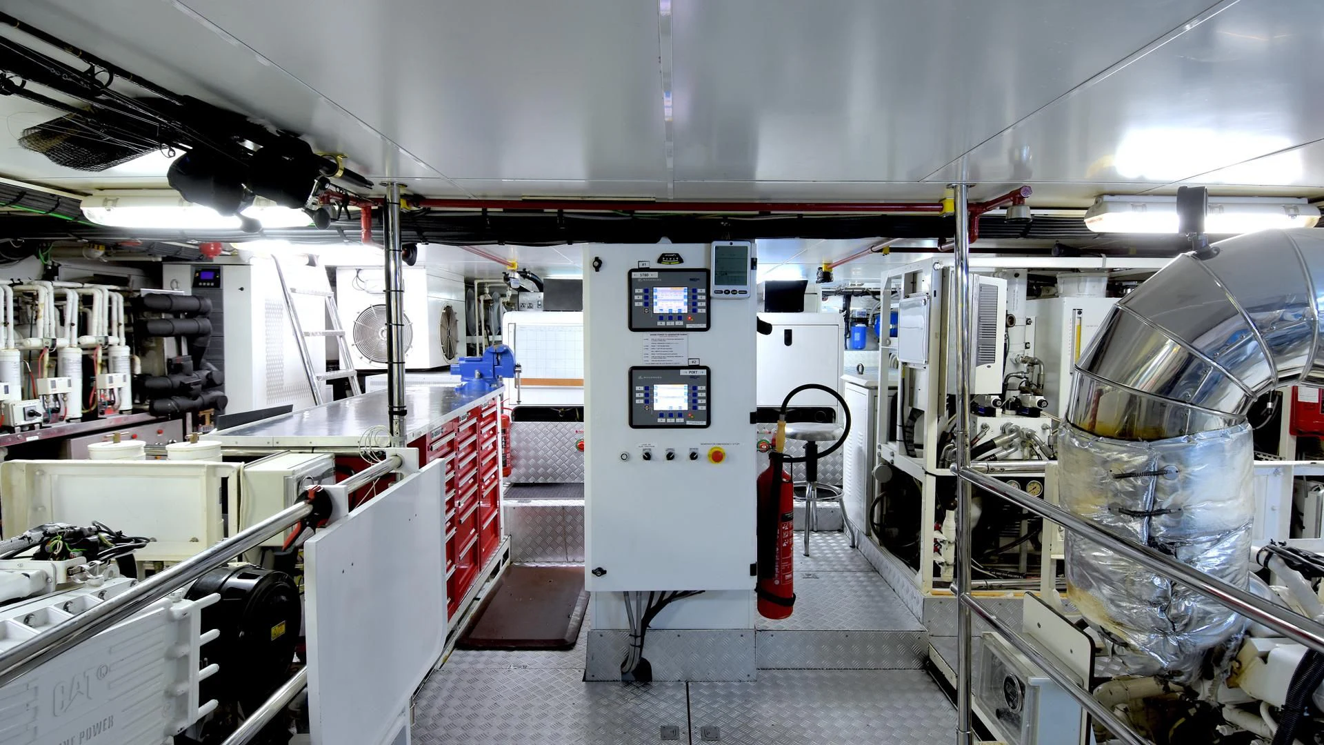a large room with machines aboard OMNIA 1 Yacht for Sale