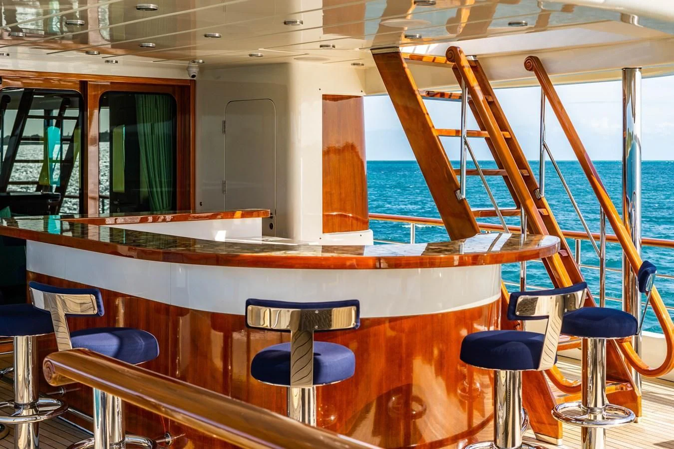 a room with a table and chairs aboard OMNIA 1 Yacht for Sale