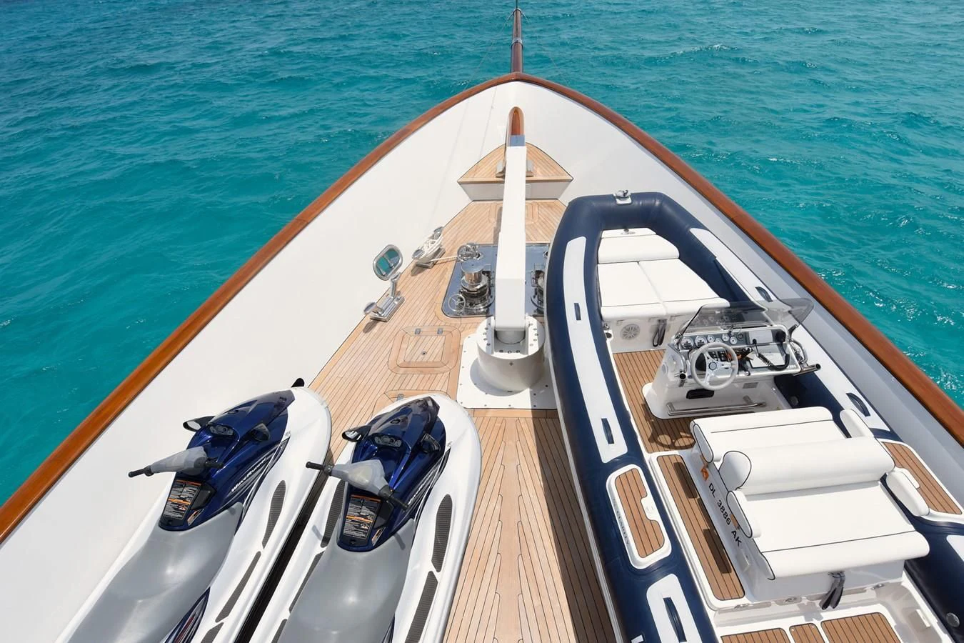 a boat with a rope attached to the front aboard OMNIA 1 Yacht for Sale