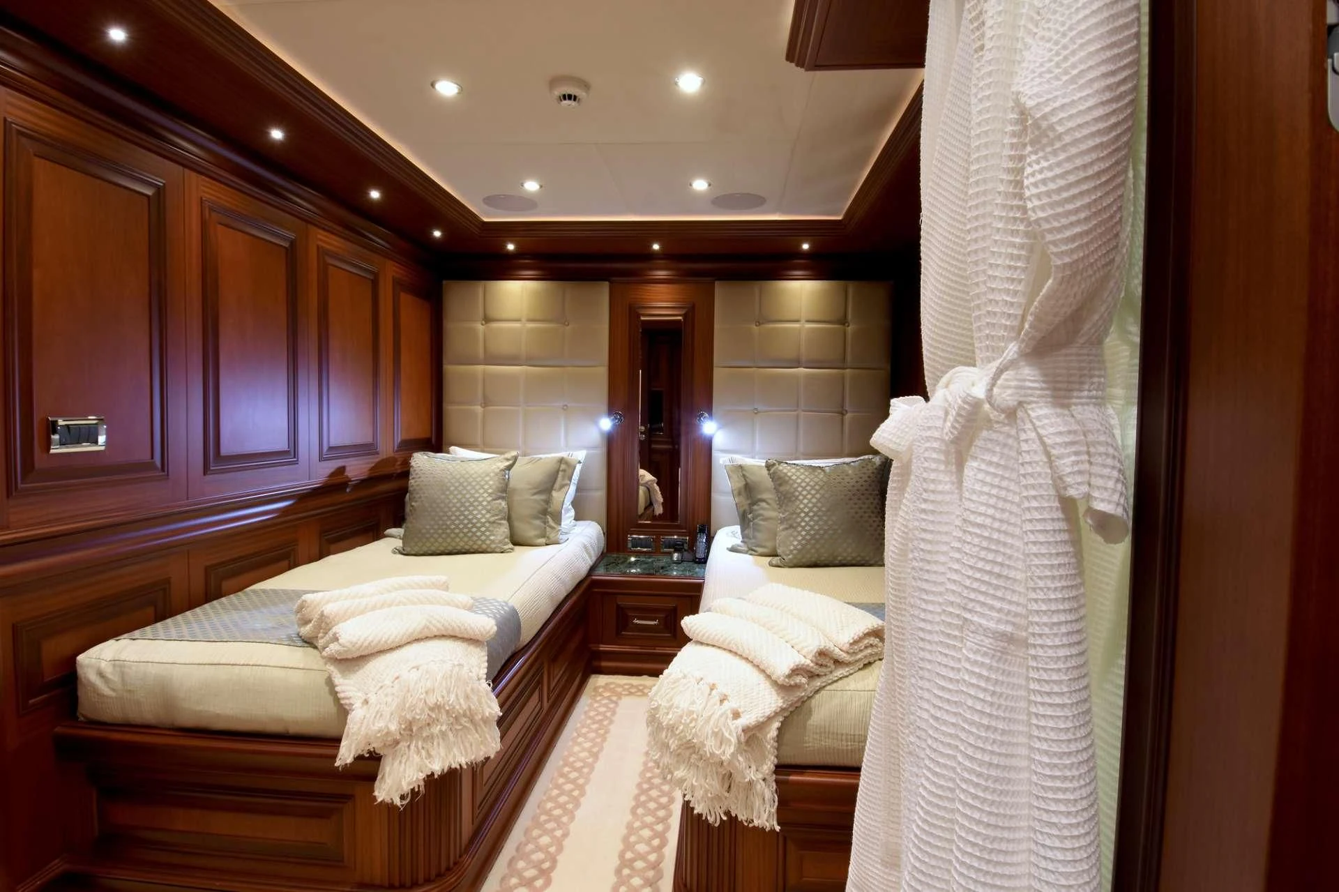 a couple of beds in a hotel room aboard OMNIA 1 Yacht for Sale