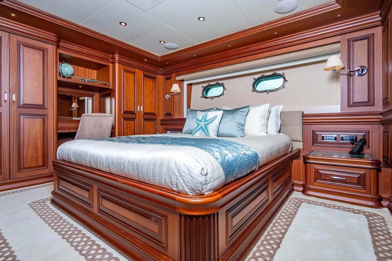 a bed in a room aboard OMNIA 1 Yacht for Sale