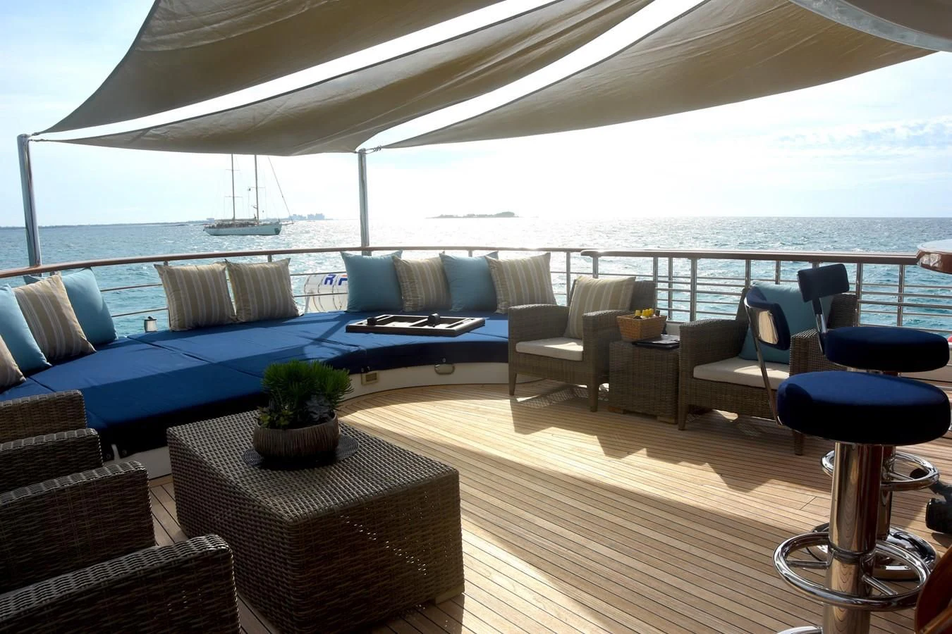 a large living room with a pool table and chairs aboard OMNIA 1 Yacht for Sale