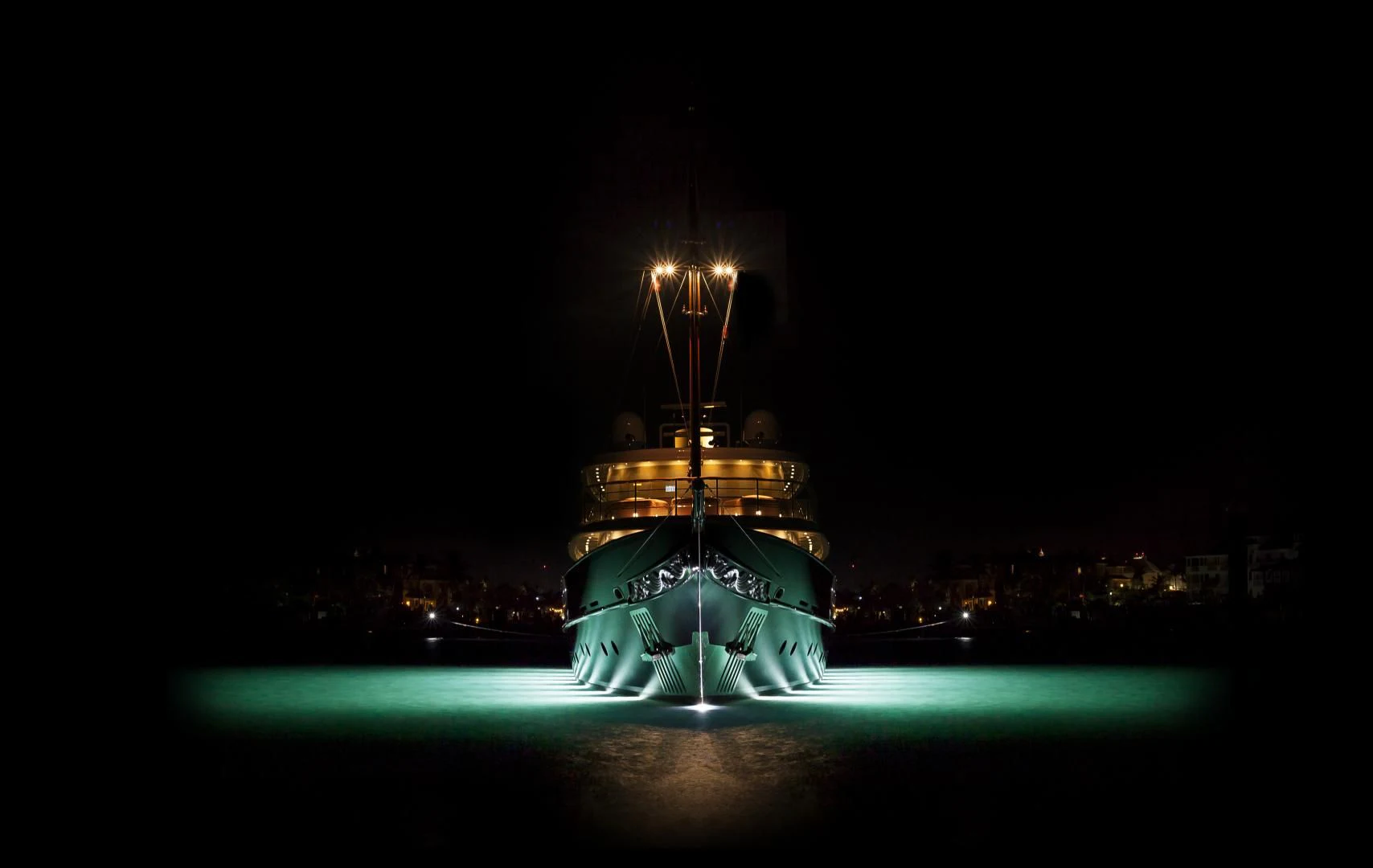 a large lighted tower at night aboard OMNIA 1 Yacht for Sale