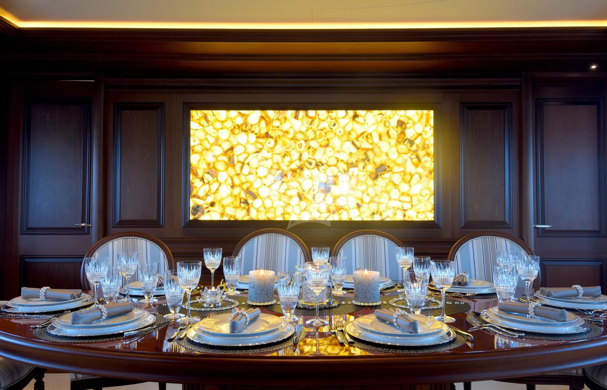 a table set for a dinner aboard OMNIA 1 Yacht for Sale