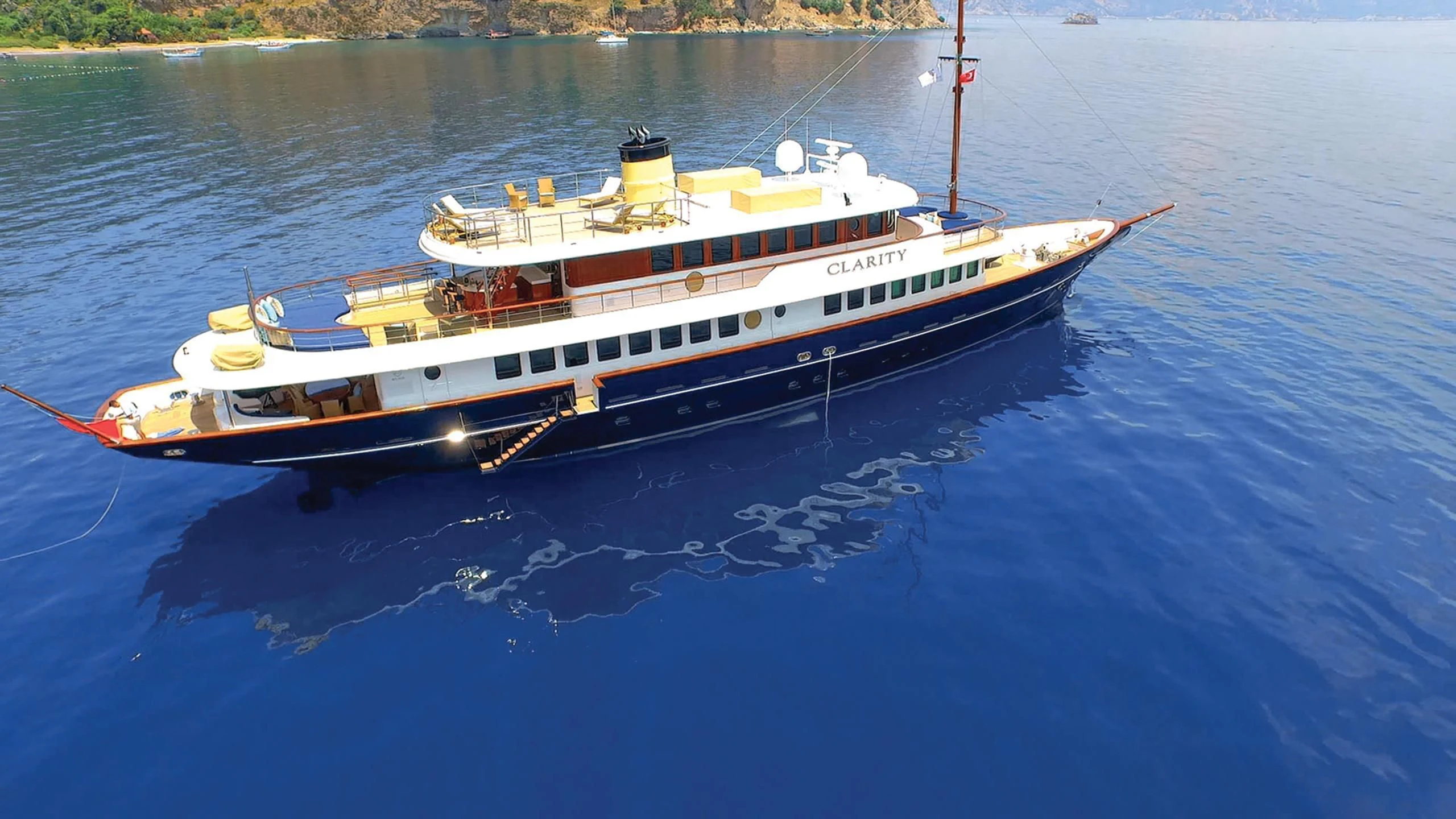 a boat on the water aboard OMNIA 1 Yacht for Sale