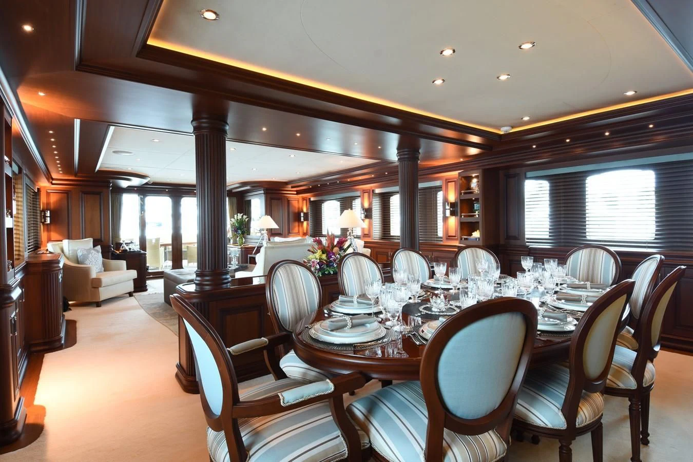a large dining room with a large table and chairs aboard OMNIA 1 Yacht for Sale