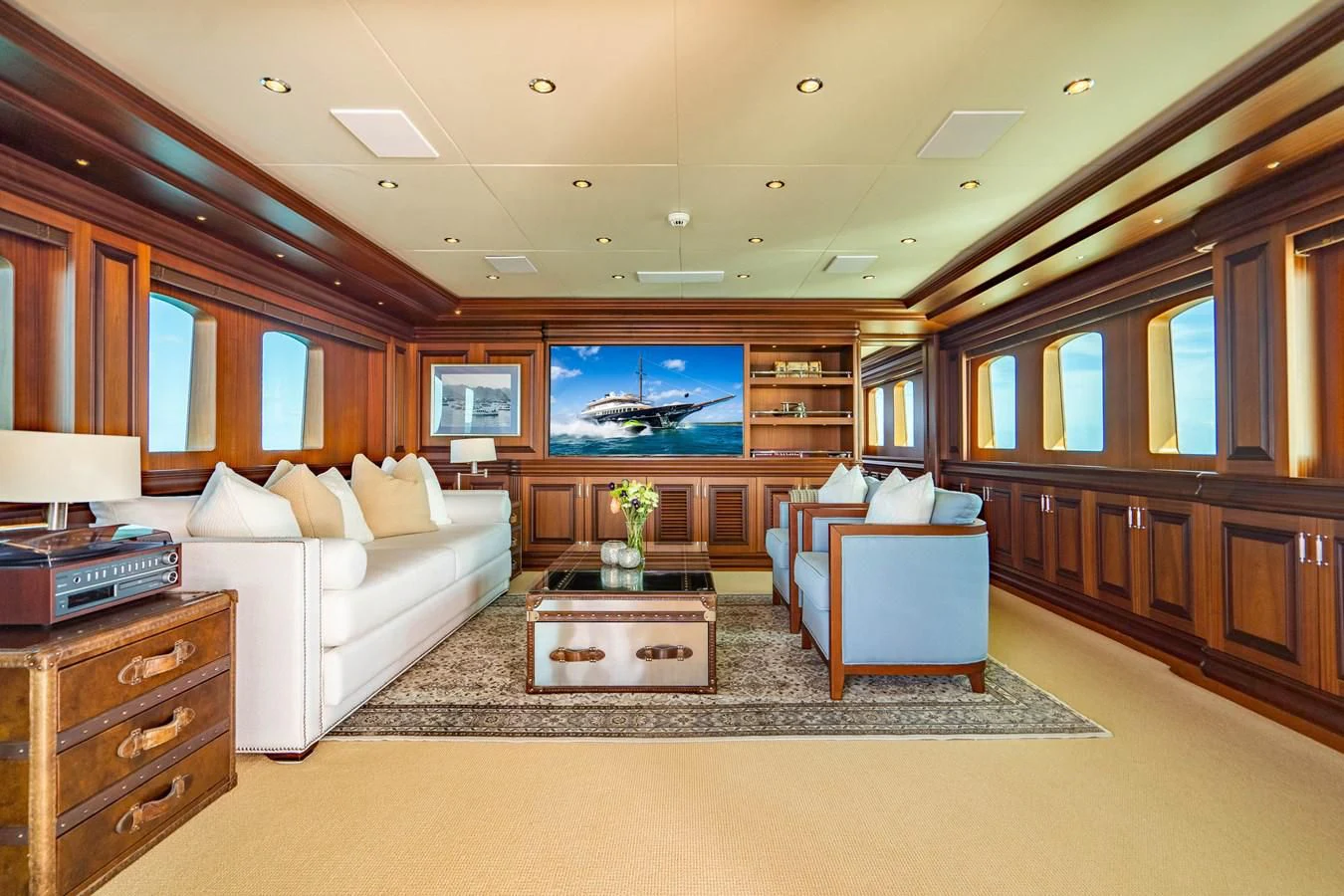 a living room with a large window aboard OMNIA 1 Yacht for Sale