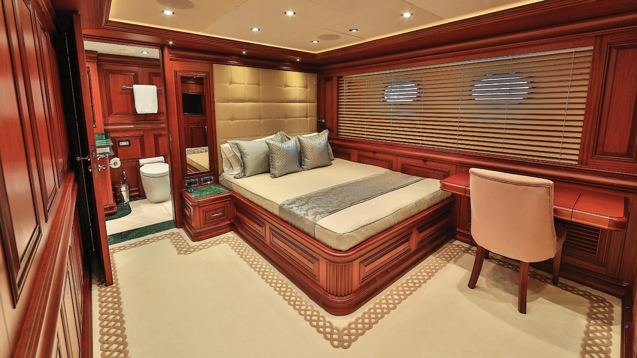 a bed in a room aboard OMNIA 1 Yacht for Sale