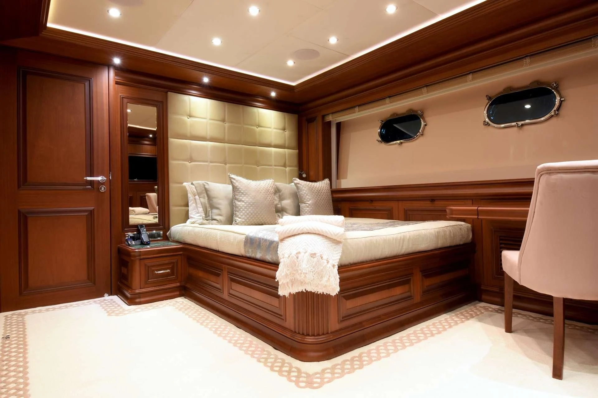 a bed in a hotel room aboard OMNIA 1 Yacht for Sale
